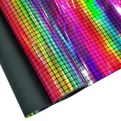 China 30x135cm Holographic Fake Rainbow Roll Waterproof Geometry Laser Leather Rolls For Making Purse for sale