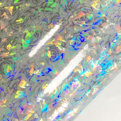 China Laser Rose Pattern New Design Waterproof Anti Scratch Holographic Soft PVC Film for Handbags Hangs Jewelry Making for sale