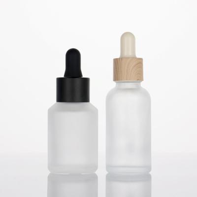 China Wholesale Cosmetic Mix Color Glass Dropper Round Matte Bottle 50ml for sale