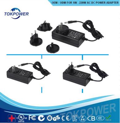 China Medical Grade Power Supply Multiple Plug Wall Mount Power Adapter Interchangeable 5W 12W 24W for sale