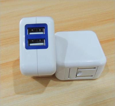 China 5v 2a 2 ports USB white charger 2.0 quick charge folding foot mobile phone charger for sale