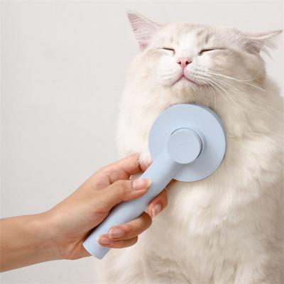 China Viable Newcomers Pet Grooming Brush Self Cleaning Dog Cat Brush Remove Dog Hairs Pet Comb for sale