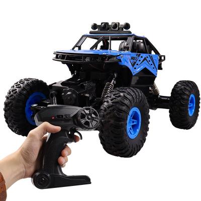 China RC Climbing Racing Car Toys 1/14 High Speed 4WD Remote Control Truck Cars Toy for Children for sale