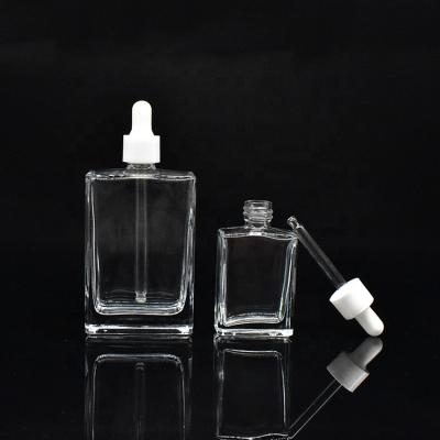 China Rectangle Cosmetic Bottle 50ml 100ml 30ml 15ml Glass Dropper Bottle With Plastic Cap Cosmetic Bottle for sale