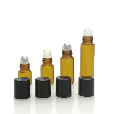 China Personal Care Porcelain 1ml 2ml 3ml 5ml Clear Amber Blue Glass Roll On Bottles With Steel Trackball for sale