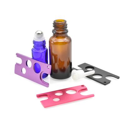 China Metal Cosmetic Colorful Bottle Opener For Essential Oil Bottle Open Roller Bottle Metal Key for sale