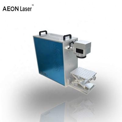 China Portable Fiber Laser Marking Machine Fiber Laser Marking Machine Laser Glass Bottle Spotting Cutting Machine à venda