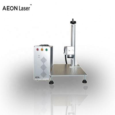 Chine Laser Fiber Laser Marking Machine Price With Rotary Bench à vendre