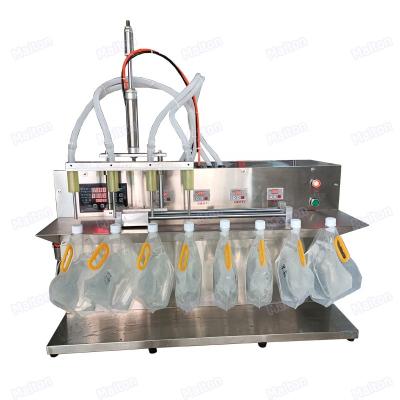 China Cheap Price 4 Head Mineral Water 10L Semi Automatic Stand Up Food Pouch Filling And Capping Machine for sale