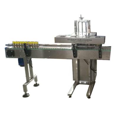 China Automatic Beverage Electromagnetic Continuous Induction Bottle Aluminum Foil Sealing Machine Plastic Sealer for sale