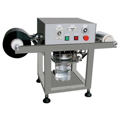 China Manual Beverage Table Top Plastic Pet Pe Mouth Can Foil Sealing Machine for sale