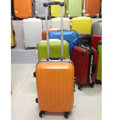 China Orange Aluminum Suitcase Luggage , 4 Rolling Wheel Light Travel Luggage Set for sale