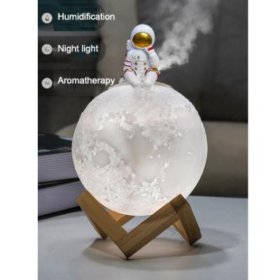 China Art Decor Resin Craft Astronaut Figurine Moon Light Damp For Home Decor And Birthday Gift for sale