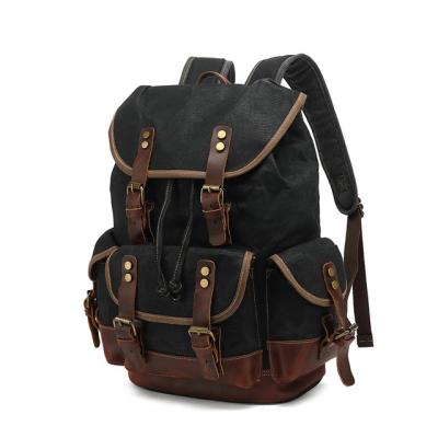 China Hot-selling Men's Outdoor Waterproof Canvas Travel Backpack Computer Bag Mountaineering Leather Bag for sale