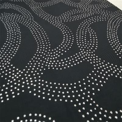 China Blackout Polyester Knitting Fabric With Shiny Stone Blocking Spandex Fabric For Clothes for sale