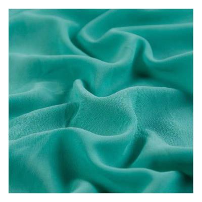 China Blackout low price 95gsm polyester chiffon crepe fabricfor wholesale custom made solid 100% solid women dress for sale