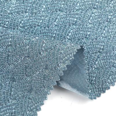 China Blackout Glitter High End Luxury Floral Knitted Polyester Lace Bonding Fabric For Clothes for sale