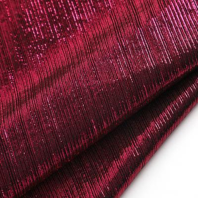 China Blackout New Fashion Scarlet Elegant Premium Knitted Polyester Spandex Hot Stamping Foil Fabric For Dresses for sale