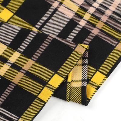 China Blackout uniform shirt material custom knitted check 95 brush print fabric poly spandex dty for sale