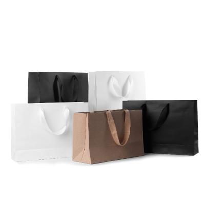 China Biodegradable Custom Rose Brown Paper Black Gift Bags Packaging Designs Printing Shopping Paper Bags With Handle for sale