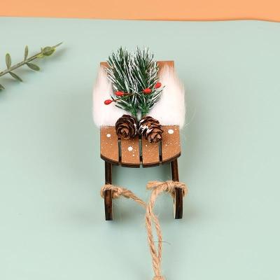 China Hot Selling Christmas Day Christmas Sleigh Ornaments Festival Home Decorative Gifts Wooden Sleigh Christmas Decoration For Office for sale