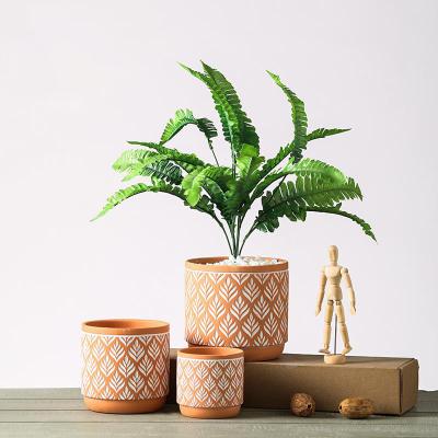 China Modern Nordic Decorative Plant Pots Ceramic Relief Terracotta Around Planter Succulent Flower Pot for sale