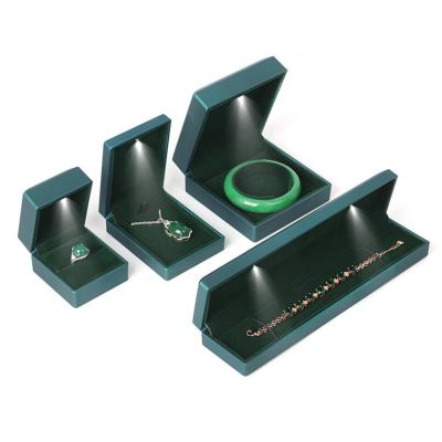 China 2021 Luxury Led Multiple Design Ring Jewelry Set Storage Box Jewelry Gift Packaging Box PC Jewelry Packaging Box for sale