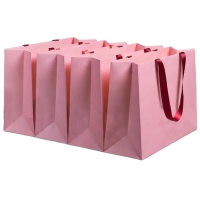 China Recyclable Wholesale Custom Logo Boutique Shopping Bag With Handle For Clothing&Shoes for sale