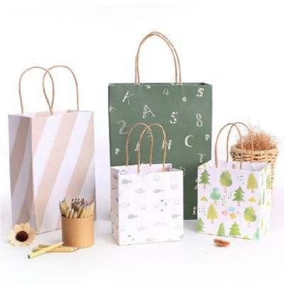 China Custom made luxury recyclable craft paper shopping bag the handle with logo for sale