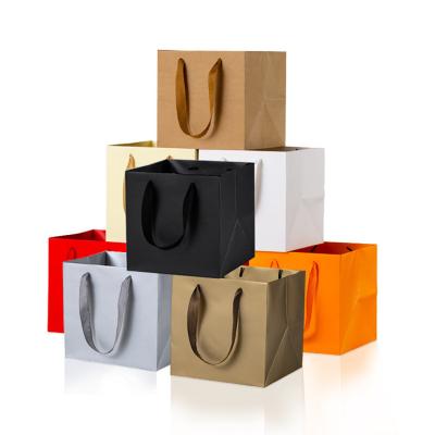 China Hot Sale Recyclable Recycle Shopping Square Kraft Paper Bag With Handle Brown High Quality Paper Tote Bags With Your Own Logo for sale