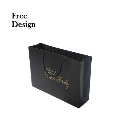 China 2022 Recyclable Wholesale Paper Bags Logo Clothes Paper Bag Custom Gold Stamping Luxury Shopping Clothes Paper Bags With Logo Ribbon Handle for sale