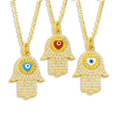 China 2021 New Style Zircon Devil Eyes Religious Hands Clavicle Necklace 18k Gold HipHop Pendant Necklace for sale