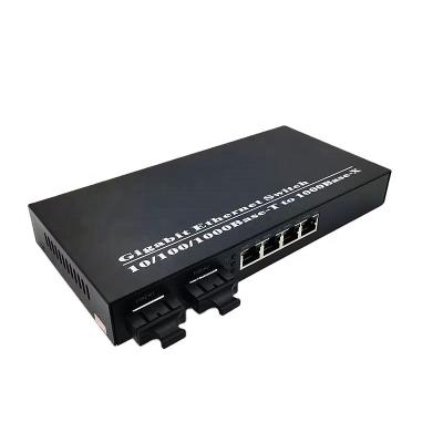 China FTTH FTTxFTTB Network Fiber Media Converter 4-TX + 2-FX  Fiber Optical Transceiver  4 RJ45 1000M to 2 Gigabit Dual SC   Fiber Optic Media Converter for sale