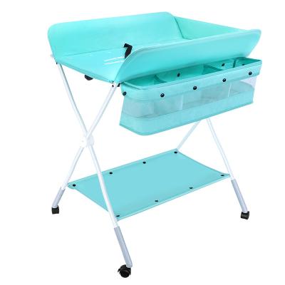 China Factory Wholesale Three Position Height Adjustment Foldable Baby Changing Table With Wheels Foldable Portable Changing Table for sale