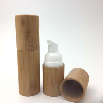 China 30ml 50ml HDPE Cosmetic Foam Pump Bottle With Bamboo Outside High Quality Eco-friendly Foam Bottles for sale