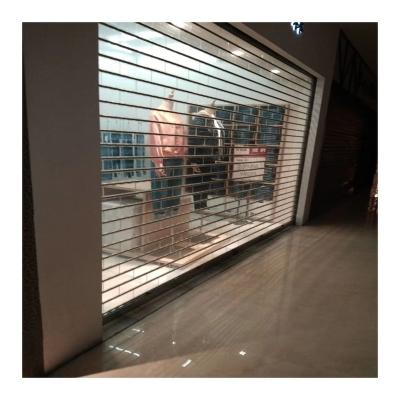 China Good Perspective Clear Slat Material Transparent Polycarbonate Crystal Roller Shutter Door for sale