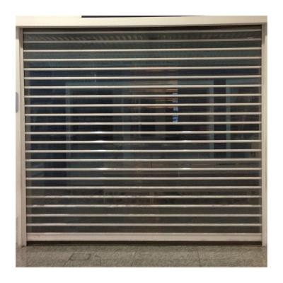 China Clear Perspective Transparent Polycarbonate Roller Shutter Security Rainproof Door For Commercial for sale