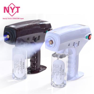 China Blue Ray Anion Spray Gun Nano Steam Mist Spray Gun Factory Low Price Handheld Electric Nano Disinfection Portable Hair Sterilizer for sale