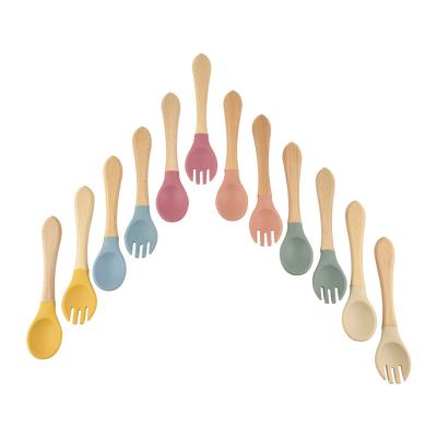 China Cute Bpa Free Silicone Wooden Baby Kids Feeding Cutlery Training Tableware Soft Spoons And Fork For Toddler for sale