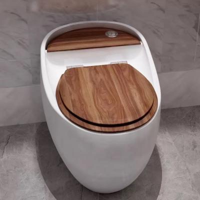 China Double-Flow Wood Texture Egg Shape Toilet Floor Position Mount Siphon Jet Elipse Lavatory Gravity Flush Commode for sale