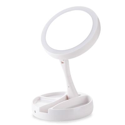 China Lighted Makeup Vanity Mirror With 10X Double Magnification Mirror Adjustable Rotating Power Supply Portable Cosmetic Mirror for sale