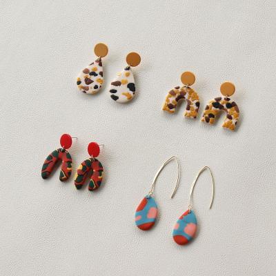 China Cute Morandi Girl Of Japanese And Korean Soft Earrings On The Other Clay Simple Earrings Long Gold Earrings for sale