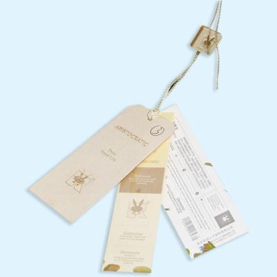 China Other Wholesale Custom Embossed Brand Name Logo On Matte Paper Cardboard Garment Hangtags for sale