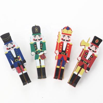 China Wooden Gift Christmas Decoration Christmas Nutcracker Clip Gift Set of 4 Confetti Set for Christmas Decorations for sale