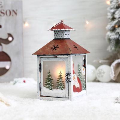 China Tabletop Fashionable Mental Decoration Christmas Candle Antique Lantern with Santa Claus Design for Wedding Garden Festival Decoration for sale