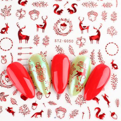 China Red Laser Snowflake Elk Christmas Tree Snowman Manicure Holographic Christmas Effect Nail Stickers Designs 2022 New Year 3D Nail Sticker Decals for sale