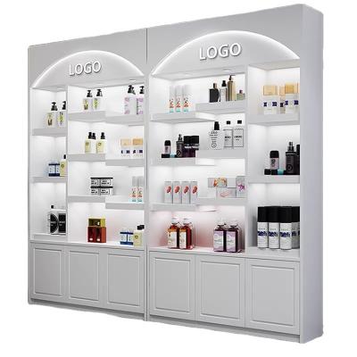 China Custom White Led Cosmetic Perfume Display Mall Wooden Furniture Storage Light Shelf Rack Cosmetic Display Cabinet For Retail Store for sale