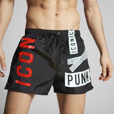 China Anti-wrinkle summer men's casual beach pants quick-drying pants breathable men's five-point shorts sports basketball shorts for sale