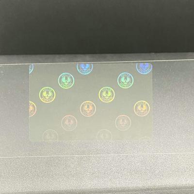 China Anti-counterfeiting self-adhesive heat foil holographic sticker overlaid transparent hologram stickers for sale