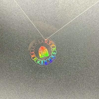 China Anti-Counterfeit Clear Hologram Sticker Die Cut Reflective Rainbow Holographic Labels Self Adhesive for sale